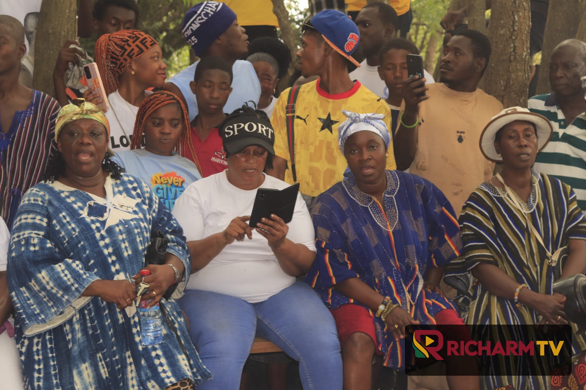 Community members gathered outdoors during the Manya Jorpanya Ngmayem Festival.